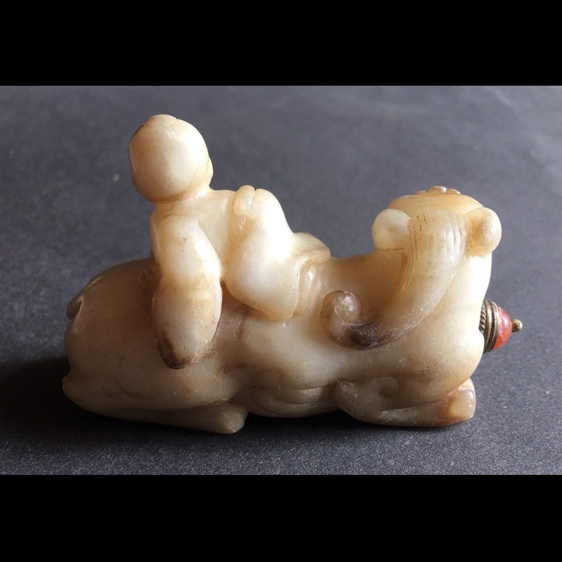 Extremely rare Tang Dynasty jade Bixie with child